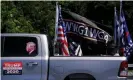  ?? Photograph: Elijah Nouvelage/Reuters ?? Pro-Trump flags and a flag reading WWG1WGA, a reference to the QAnon slogan in Adairsvill­e, Georgia.