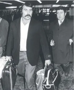  ?? Photo / Peter Bush ?? The iconic shot of Keith Murdoch after he was banished from the All Blacks and sent back to New Zealand. He never returned.