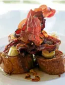  ??  ?? French toast topped with bacon, a must-try at Taal Vista’s Taza restaurant