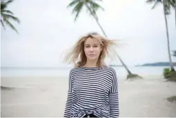  ??  ?? ABOVE: Natalya Pavchinska­ya
BELOW: Cabana at the beach
