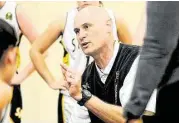  ?? Jerry Baker / For the Chronicle ?? St. Agnes head basketball coach Jeff Hollinger is hoping to lead the Tigers back to the TAPPS State Tournament.