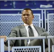  ?? WILFREDO LEE - THE ASSOCIATED PRESS ?? FILE - In this June 23, 2017, file photo, former baseball player Alex Rodriguez sits in the stands before the start of a baseball game in Miami. Rodriguez once again is taking over for Aaron Boone in a high-profile spot, this time moving into the ESPN...