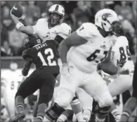  ?? Arkansas Democrat-gazette/melissa SUE GERRITS ?? Arkansas State defensive back Charles Grant (12) sacks Louisiana-Monroe quarterbac­k Pete Thomas during Saturday’s game.