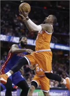  ?? TONY DEJAK — THE ASSOCIATED PRESS ?? The Cavaliers’ J.R. Smith drives to the basket against the Pistons’ Andre Drummond in the first half.