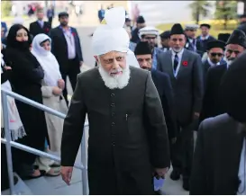  ?? PHOTOS: LEAH HENNEL ?? His Holiness Hazrat Mirza Masroor Ahmad, fifth Caliph of the Ahmadiyya Muslim faith, arrives at the Baitun Nur Mosque on Tuesday.