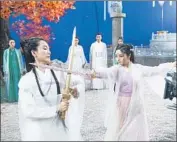  ??  ?? ACTRESSES work on a set in Hengdian, which has 13 themed shooting areas scattered throughout.