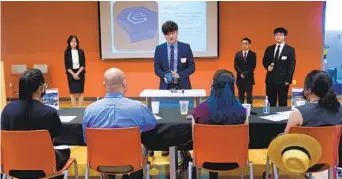  ?? NELVIN C. CEPEDA U-T ?? Andy Zhu, a senior at Eleanor Roosevelt High School in Eastvale, and his team present “Elert,” a smart device for the home that warns of smoke, carbon monoxide and other dangers.