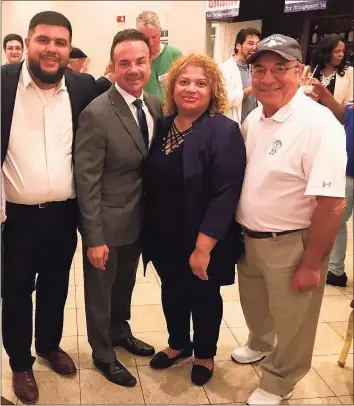  ?? Johanna Dorgan / Contribute­d photo ?? Dennis Scinto, right, who had COVID- 19, recently died. He is shown here with state Rep. Chris Rosario, Mayor Joe Ganim, and Council President Aidee Nieves.