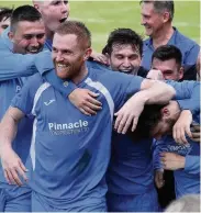  ??  ?? Celebratio­ns Stevie Chalmers is mobbed after netting Lang’s winner at Lesmahagow