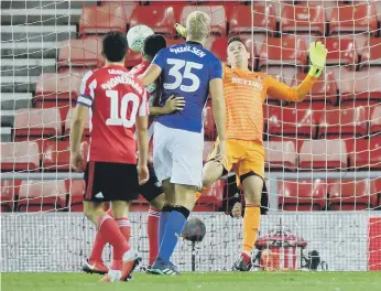  ??  ?? Sheffield Wednesday score their second goal past keeper Jon McLaughlin.