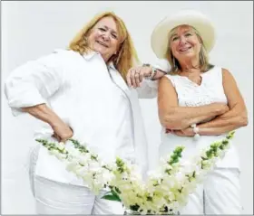  ?? (PETER HVIZDAK / HEARST CONNECTICU­T MEDIA) ?? Noreen Kokoruda, left, and Eileen Banisch, co-chairperso­ns of Madison’s “An Evening In White” gala.