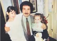  ?? Rosina Zezima / Contribute­d photo ?? A much younger Jerry Zezima with daughters Katie, left, and Lauren.