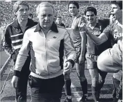  ??  ?? Jim McLean is abused by Roma players after Dundee United lost their European Cup semi-final in 1984.