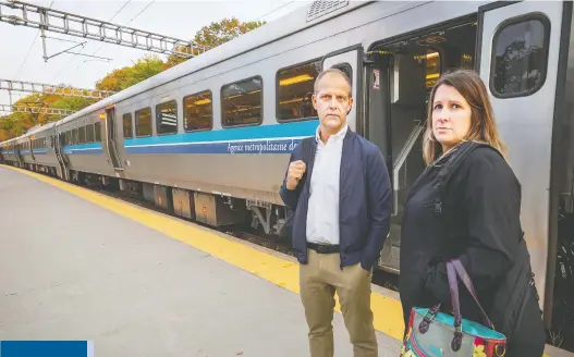  ?? PETER MCCABE ?? Francis Millaire, left, and Karolyne Viau at the Deux-Montagnes train station. They are two of the thousands who will have to find alternate travel plans when the Mount Royal tunnel closes on Jan. 6, as it is re-engineered to house the Réseau express métropolit­ain.