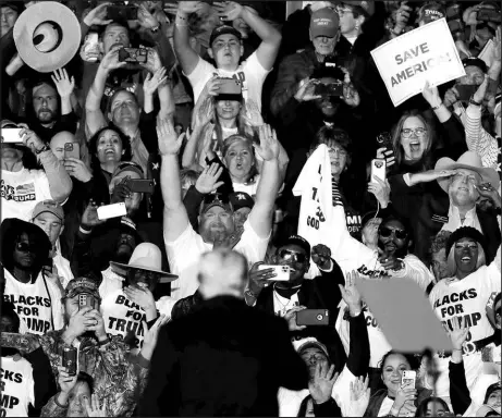  ?? JASON FOCHTMAN / HOUSTON CHRONICLE VIA AP ?? People cheer for former President Donald Trump at a rally Saturday in Conroe, Texas.