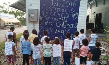  ??  ?? Children from the refugee and asylum seeker community on Nauru take part in a protest against Australia’s immigratio­n policies in 2016. This week the last remaining children were moved off the Pacific island. Photograph: None