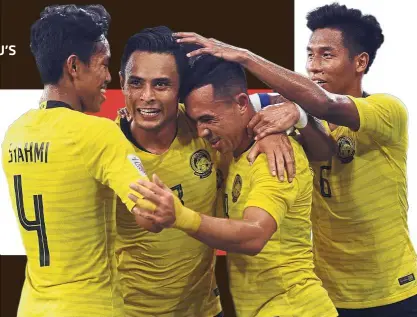  ?? — Bernama ?? Roaring at home: Malaysia’s Norshahrul Idlan Talaha (second from right) celebratin­g with teammates after scoring against Myanmar in the AFF Suzuki Cup Group A match at the National Stadium in Bukit Jalil last night. Malaysia won 3- 0 to reach the semi-finals.