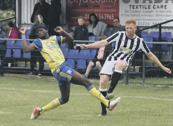  ??  ?? Jack Bloodworth (stripes) scored for Peterborou­gh Northern Star at Harborough