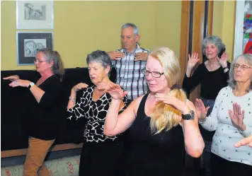  ??  ?? A Tai Chi Class at Maggie’s in Cheltenham and, below, a memory jar Pictures: Mark Watkins