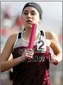  ?? Bud Sullins/Special to the Herald-Leader ?? Chloe McGooden runs her leg of the 4x800-meter relay.