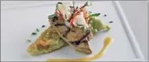  ??  ?? “The Best of the Best” five-course chef’s menu ($85) at Zealous includes the grilled Hudson Valley foie gras on lobster toast with roasted pineapple vinaigrett­e