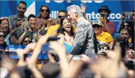  ??  ?? STUDENT MARY BESSELL introduces Clinton, who praised his wife and did not mention Bernie Sanders, her rival for the Democratic nomination, by name.