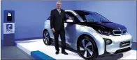  ??  ?? Karsten Engel, president and CEO, BMW Group Region China, with the newly debuted BMW i3 Lifestyle.