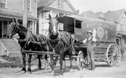  ??  ?? Above: A Hudson’s Bay Company delivery man stands beside his team of horses in Vancouver in 1906. Top right: A 1965 advertisem­ent for HBC point blankets declares them to be “the world’s most famous blankets.”
Right: An HBC employee works the pharmacy counter at the Winnipeg store in 1937.
Bottom right: A sign alerts shoppers that HBC announcers are “on the air” during a 1940 broadcast from the Bay Broadcast Studio, located in the Calgary HBC store. Below: A 1939 brochure for Hudson’s Bay blankets and blanket coats displays a selection of items including coats and mitts, hunting caps for men, and cadet caps for women.