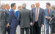  ?? AFP ?? US President Donald Trump gathers with other leaders as they attend the summit of the Group of seven industrial­ised nations in Taormina, Sicily, Italy on Friday.