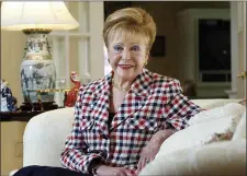  ?? MIKE DERER - THE ASSOCIATED PRESS ?? In this 2004file photograph, author Mary Higgins Clark poses in her home in Saddle River, N.J. Clark, the tireless and long-reigning “Queen of Suspense” whose tales of women beating the odds made her one of the world’s most popular writers, died Friday, Jan. 31, at age 92. Clark’s publisher, Simon & Schuster, announced that Clark died in Naples, Fla, of natural causes.