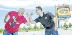  ?? BOB TYMCZYSZYN/POSTMEDIA NEWS ?? Charles Martinet poses with Niagara Falls Comic Con organizer Chris Dabrowski outside the Scotia Bank Centre. Martinet has voiced this title character of Nintendo’s flagship video game franchise since 1995, and he also voices related characters such as...