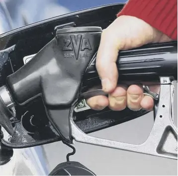  ??  ?? 0 Motorists have seen the price of petrol and diesel at the pump nudge up from lockdown lows