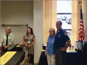  ?? CHAD FELTON — THE NEWS-HERALD ?? Lake County Sheriff Daniel A. Dunlap and his wife, Lu, at the sheriff’s office on Aug. 30 during his official retirement party. After 46 years of law enforcemen­t service to the citizens of Lake County, 27 as sheriff, Dunlap has decided to retire. His last day is Aug. 31.