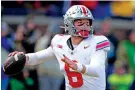  ?? CARLOS OSORIO/ASSOCIATED PRESS FILE PHOTO ?? Ohio State quarterbac­k Kyle McCord throws during a Nov. 25 game against Michigan in Ann Arbor, Mich.