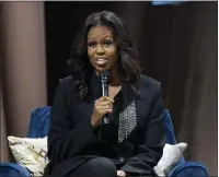  ?? JOSE LUIS MAGANA — THE ASSOCIATED PRESS ?? Former first lady Michelle Obama speaks about her memoir “Becoming” during a book tour stop in Washington on Saturday.