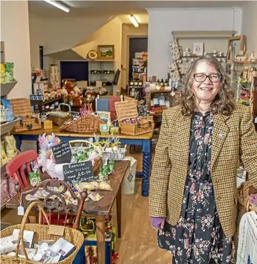  ?? ?? LIVING THE DREAM: Nicola amid the displays in Alford. Picture by Kami Thomson.