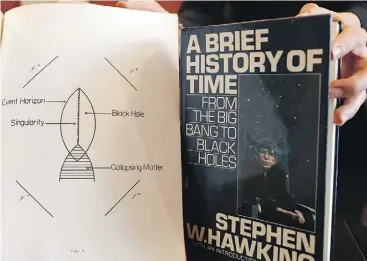  ?? FRANK AUGSTEIN/ THE ASSOCIATED PRESS ?? A signed copy of A Brief History of Time will be among the items available at auction.