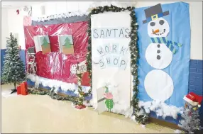  ?? Westside Eagle Observer/MIKE ECKELS ?? Daniel Meyers’ class won first place for the Winter Door Decorating Contest at Decatur High School in Decatur Dec. 17 for this display in the main hallway at the school.