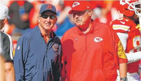  ?? | GETTY IMAGES ?? ESPN reported the Chiefs will try to extend the contract of coach Andy Reid ( right, with Bears coach John Fox) this offseason.