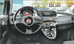  ??  ?? The 2019 Fiat 500 cockpit includes a variety of standard and optional features, including special upgrades for Abarth models.