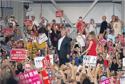  ?? Picture: Getty. ?? President Trump is greeted by supporters on his arrival in Florida: