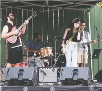  ?? GREG SOUTHAM ?? Kat Zel fronts Orchard Sky during the Lord of the Wings show on the patio at Re/max Field Saturday.