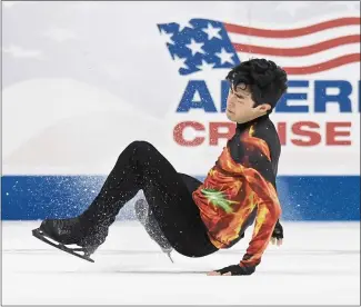  ?? PHOTOS BY MARK ZALESKI — THE ASSOCIATED PRESS ?? Nathan Chen falls in the men’s free skate program during the U.S. Figure Skating Championsh­ips on Sunday in Nashville, Tenn, but still easily won his sixth nationals title and secured his place on the Olympic team.