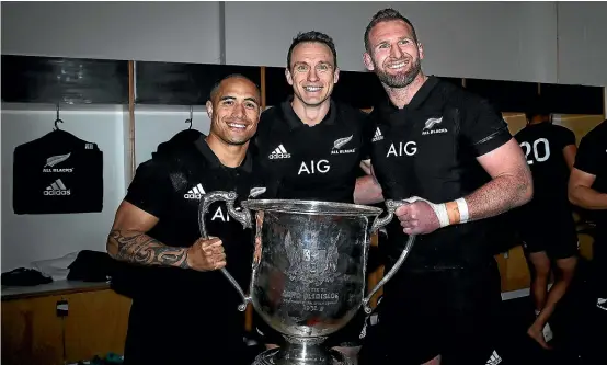  ??  ?? Aaron Smith, left, Ben Smith and Kieran Read, seen here with the Bledisloe Cup, will be part of the All Blacks team that will attempt to retain the World Cup in Japan next year.