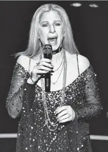  ?? AP ?? Barbra Streisand, 70, performs "The Way We Were" at the Oscars while trying not to look the way she is chronologi­cally.