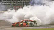  ?? CHASE STEVENS/ASSOCIATED PRESS ?? Martin Truex Jr. celebrates Sunday after winning at the Las Vegas Motor Speedway.