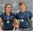  ??  ?? Louisa Weber and Wilson Reyhan win their ISGA Scottish Open trophies