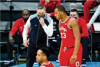  ?? DARRON CUMMINGS / AP ?? “We know there are no guarantees in the tournament,” said Ohio State coach Chris Holtmann, talking with freshman Zed Key. “...Every game is a challenge in the tournament. There are no easy ones.” As the No. 2 seed all-time, the Buckeyes are 8-3 in NCAA Tournament play.