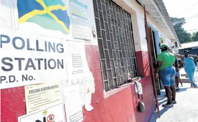  ?? RUDOLPH BROWN/PHOTOGRAPH­ER ?? Voters wait at a polling station to cast their ballot on February 26.