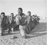  ?? ?? ■ Soldiers of Moananui-a-Kiwa Ngārimu’s 28th New Zealaand (Māori) Battalion earned a fearsome fighting reputation. Here, men of the unit perform the traditiona­l haka in North Africa.